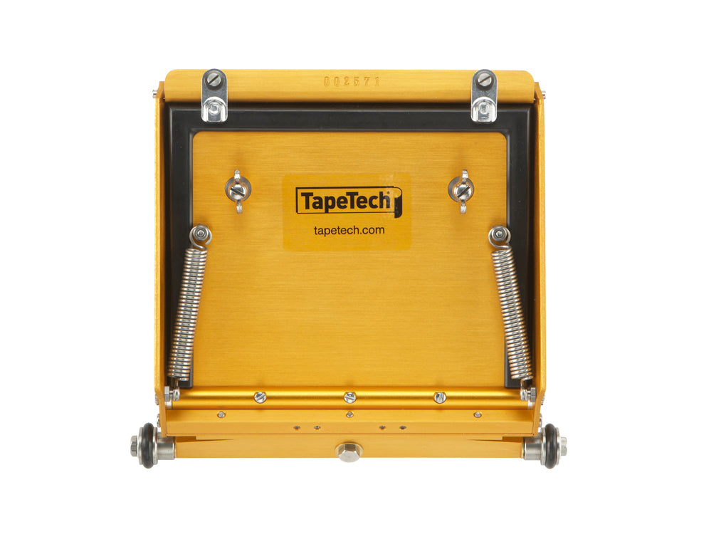 Back view of 10-inch TapeTech MAXXBOX Extra High Capacity Flat Box with gold aluminum body, brass blade holder, and crown control