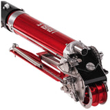 Close-up of Level 5 Automatic Taper head with a red and black billet aluminum body, steel components, and white creaser wheel, right side