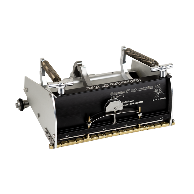 8-inch Columbia Automatic Flat Finishing Box made from billet aluminum with a black painted finish, steel components, a brass blade holder, and wheels