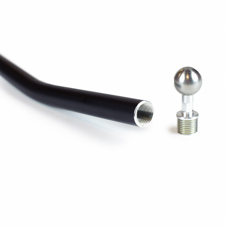 Close-up of the Columbia Closet Monster with the ball bearing unscrewed, standing upright beside the end of the black painted handle