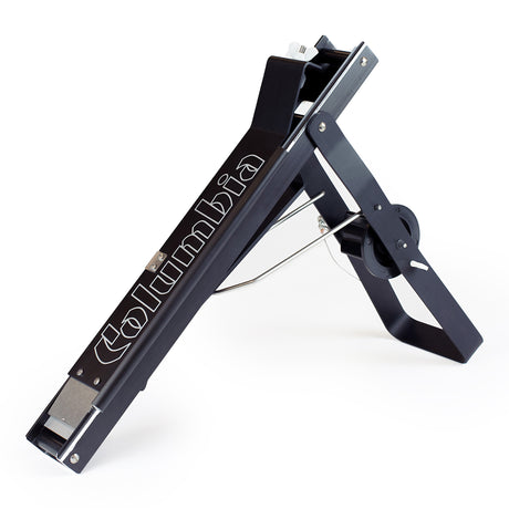 Columbia Semi-Automatic Taper with black finish and a tape spool, quarter view